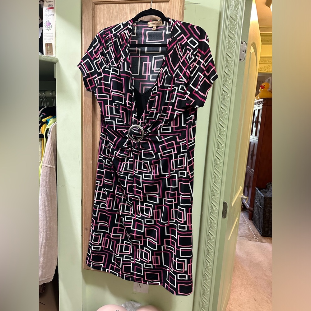 Dress. Size L.  Notations 94% polyester 6% spandex.